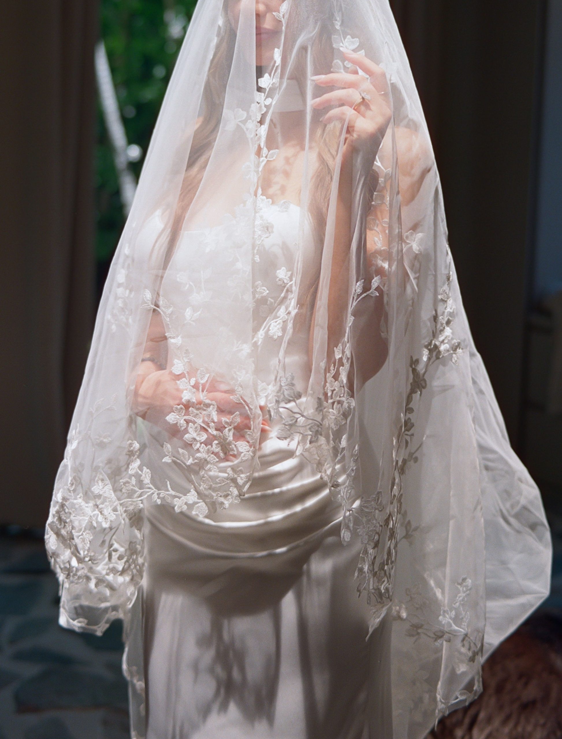 bride getting ready veil