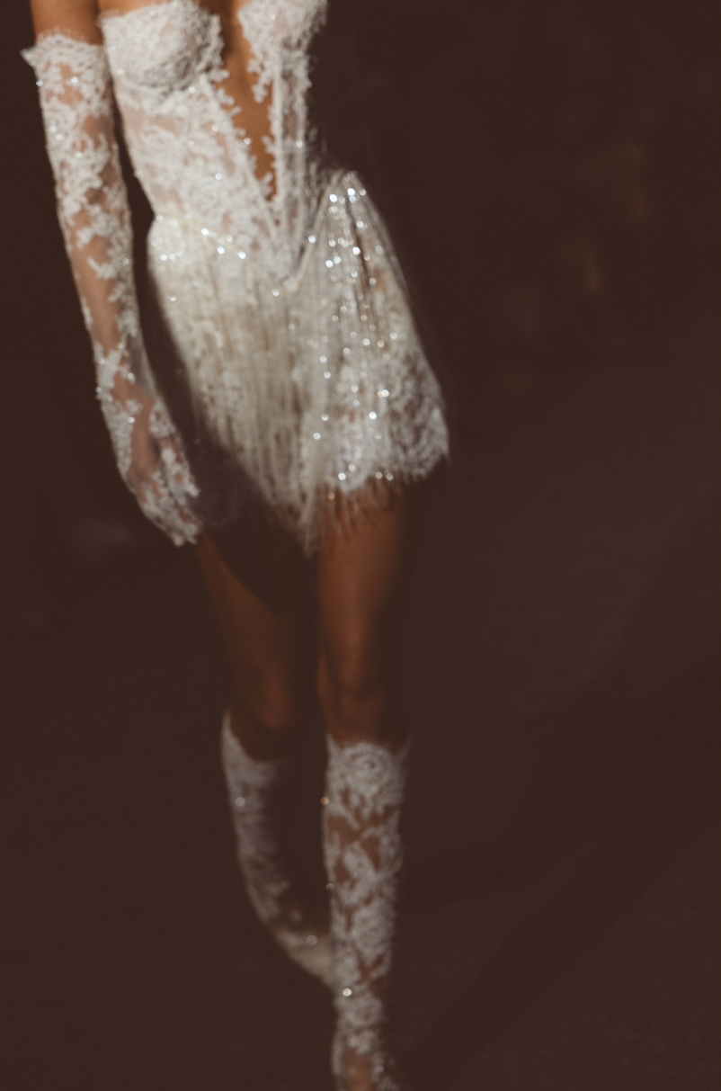 Berta Fall 2027 Élysée collection featuring glamorous couture wedding dresses and dramatic bridal silhouettes