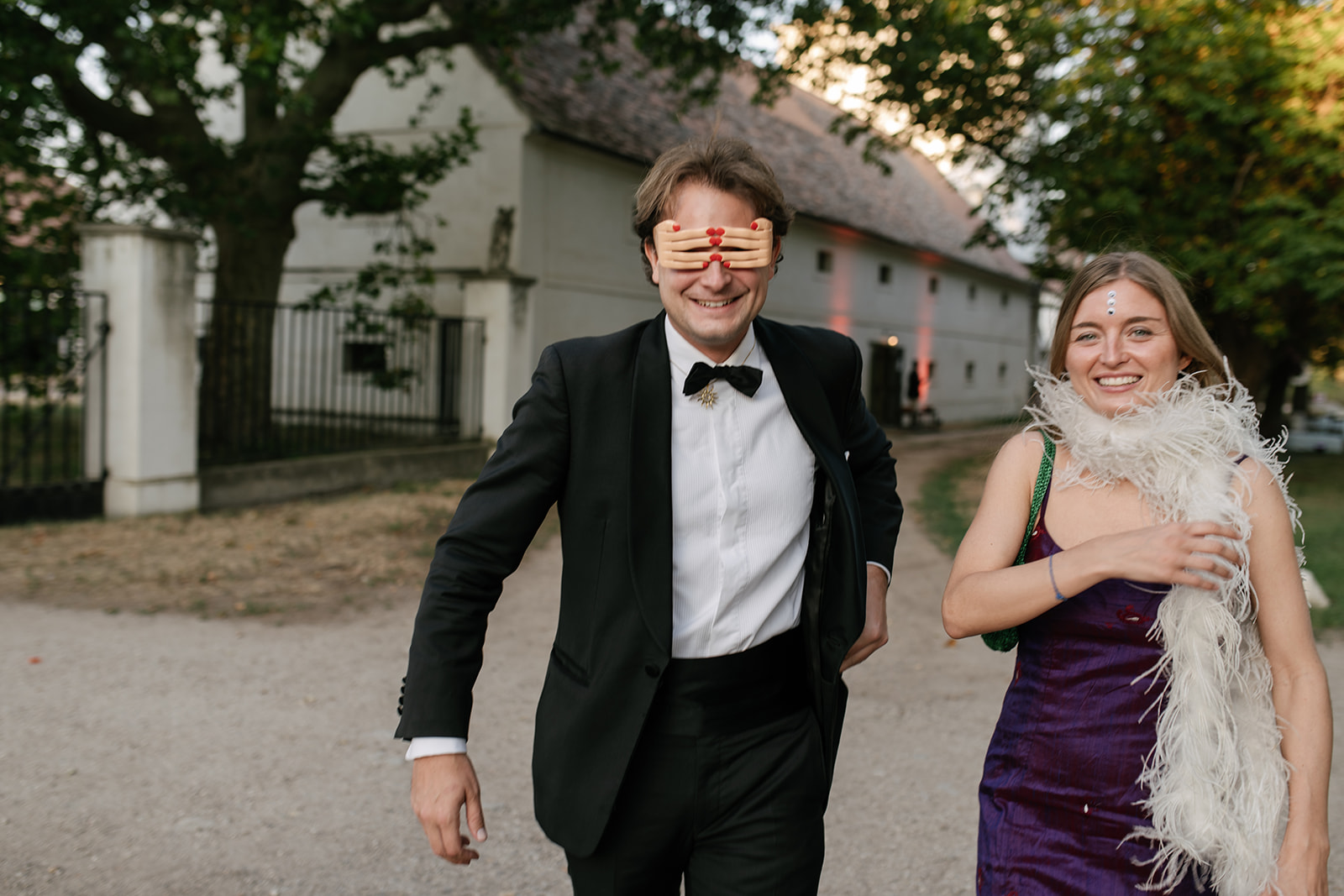 guest wearing a black tuxedo